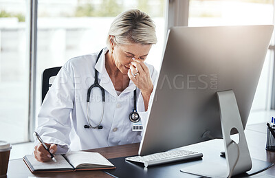 Buy stock photo Healthcare, doctor and woman with headache, stress and depression in office, burnout and overworked. Female employee, consultant tired or senior medical professional in workplace, computer or anxiety