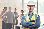 Portrait, construction worker and leadership with a man engineer standing arms folded in an architecture office. Industrial, manager and building with a male architect working on a design project