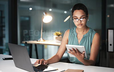 Buy stock photo Tablet, laptop and night woman reading finance portfolio feedback, stock market database or ecommerce review. Forex investment budget, data analysis and African trader trading NFT, bitcoin or crypto