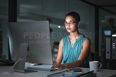 Buy stock photo Computer reading, focus and African woman editing article for social media app, website or online web blog. Employee typing, late night research review and overtime journalist working on news post