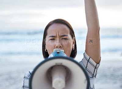 Buy stock photo Megaphone, climate change protest and Asian woman at beach protesting for environment, global warming and to ocean stop pollution. Save the earth, activism and angry female shouting on bullhorn.