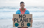 Save earth, sign and man portrait at beach pollution, environment and green, eco planet protest. Ocean, sea and angry person with nature globe poster for awareness, global warming and climate change