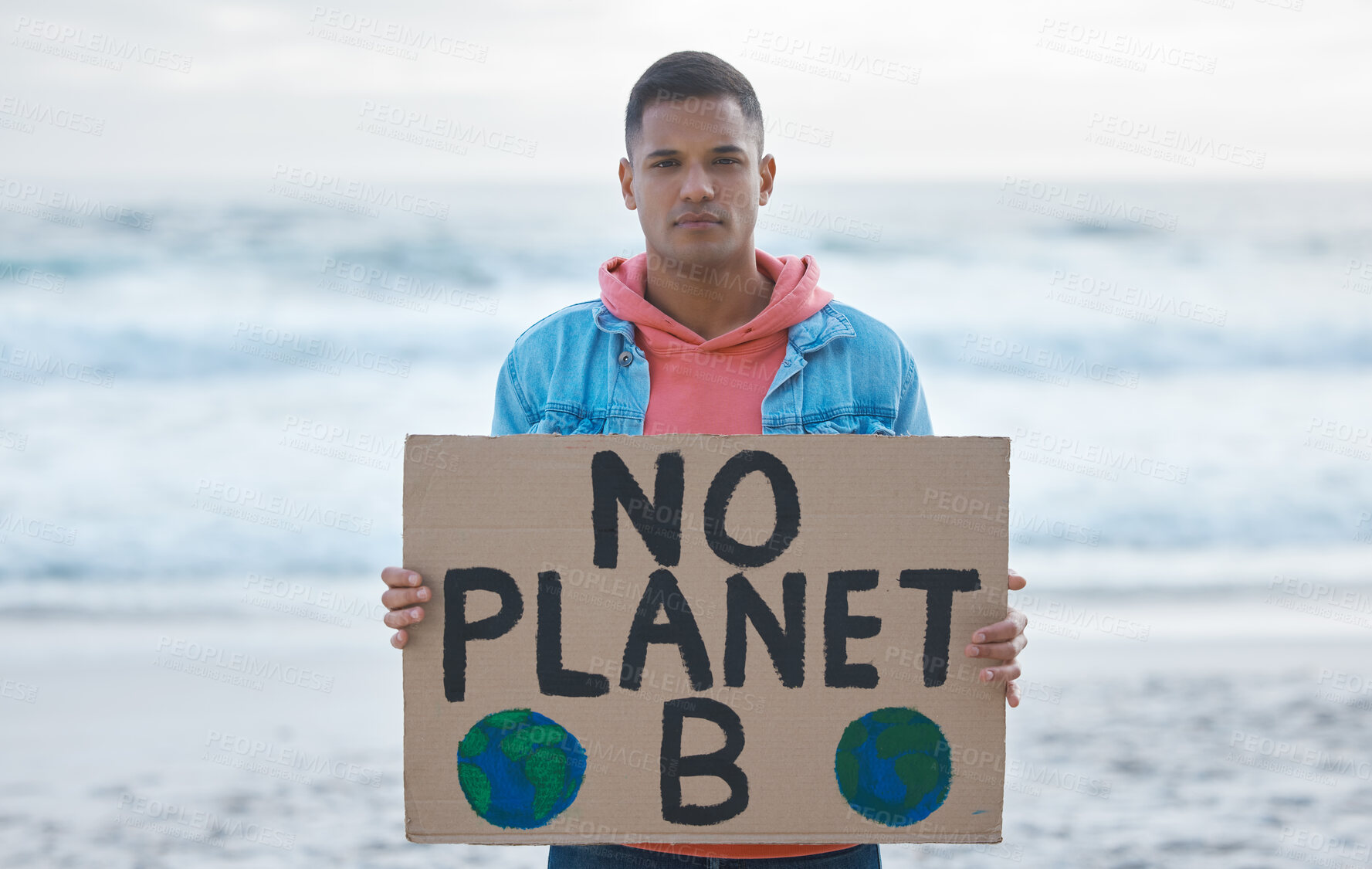Buy stock photo Save earth, sign and man protest at beach pollution, environment and green, eco planet. Ocean, sea and portrait of person with nature globe poster for awareness, global warming and climate change