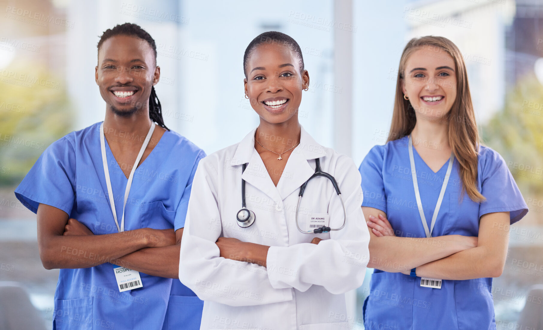 Buy stock photo Doctors team, arms crossed and portrait at hospital with teamwork, diversity and solidarity for healthcare. Nurse, black man and women leader for student internship, and collaboration for wellness