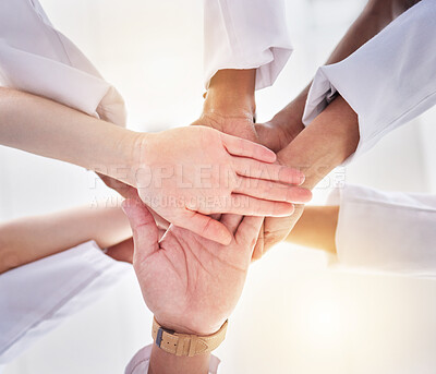 Buy stock photo Healthcare, support and below hands of doctors for motivation, partnership and medicine success. Teamwork, trust and community of medical workers for solidarity, mission and collaboration goals