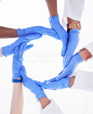 Buy stock photo Connection, circle and teamwork, doctors hands isolated on white background for synergy and workflow. Healthcare group, medical staff together for cooperation, solidarity or problem solving below