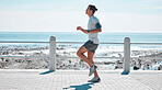Fitness, sports and man running by ocean in action for wellness, performance and athlete endurance. Nature, motivation and male runner by sea for exercise jog, marathon training and cardio workout