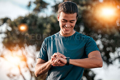 Buy stock photo Smart watch, man and fitness at park for exercise workout, training and happy goals. Stopwatch, sports person and runner check time, heart rate or monitor healthy body progress, data app and wellness