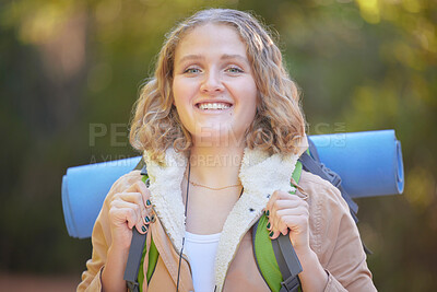 Buy stock photo Hiking, happiness and portrait of woman with backpack, smile and freedom on trekking adventure in nature. Health, fitness and camping, happy face of gen z person on hike in mountains or forest of USA