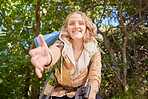 Woman hiking, nature portrait and helping hand pov with happiness, goal or outdoor adventure in summer. Happy hiker girl, free and smile in sunshine, woods or forrest on walk with backpack on holiday