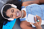 Top view, music headphones and black woman with phone for streaming podcast and radio. City technology, cellphone and happy female laughing with 5g smartphone for social media or internet browsing