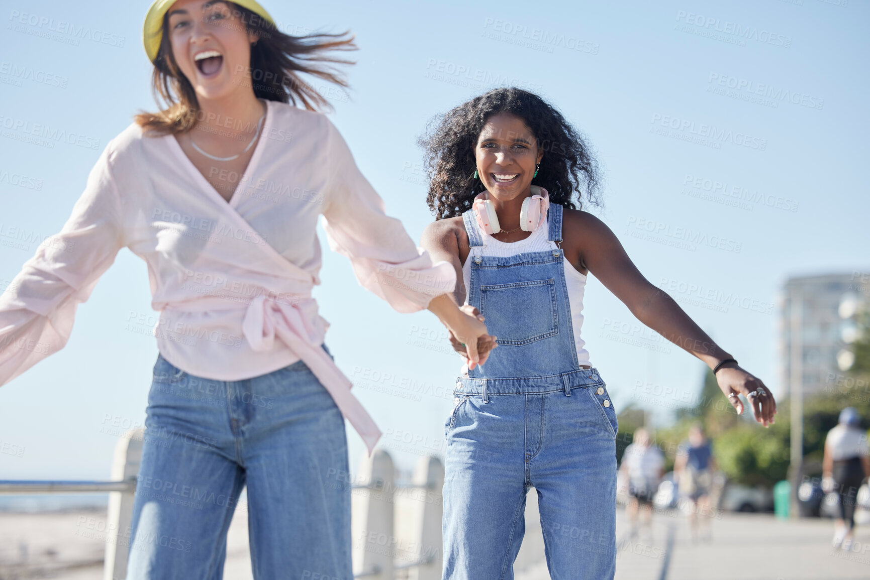 Buy stock photo Portrait, holding hands and skate sport girl friends back on outdoor promenade with balance and skating. Woman, skate and friendship of women on summer holiday break doing a fun activity on pavement