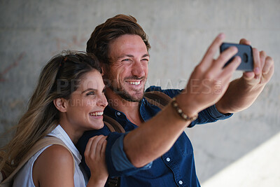 Buy stock photo Selfie, love and happy with a couple together, posing for a picture while on holiday or vacation. Photograph, travel or tourism with a man and woman posing while bonding outdoor in a foreign country