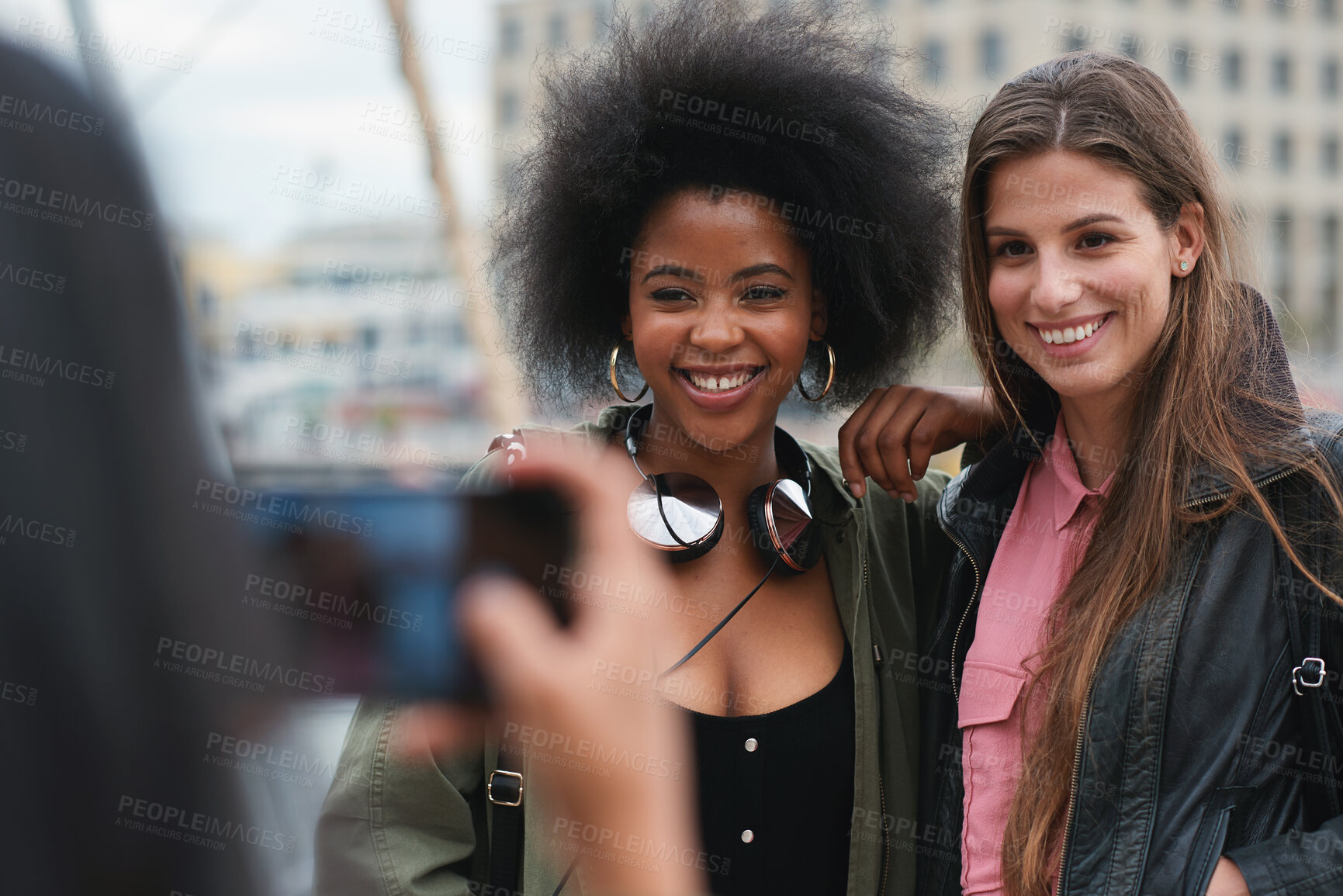 Buy stock photo Travel, photography and friends in a city, happy and smile for  photo while bonding on blurred background. Social media, influencer and women pose for profile picture, blog or post in South Africa