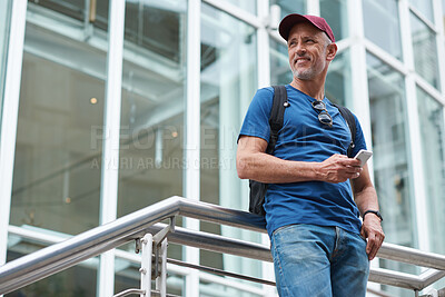 Buy stock photo Happy mature man with phone in city travel for communication, 5g technology or networking. Entrepreneur person with smartphone on urban stairs for social media and thinking of job or work opportunity