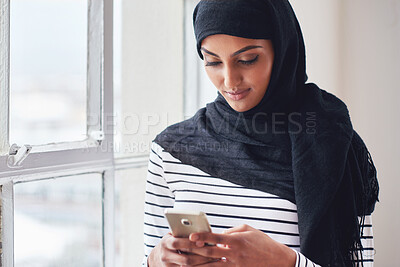 Buy stock photo Phone, typing or Muslim woman in office for social media, reading blog or networking. Search, internet or hijab girl on smartphone for communications, online content news or scroll on app
