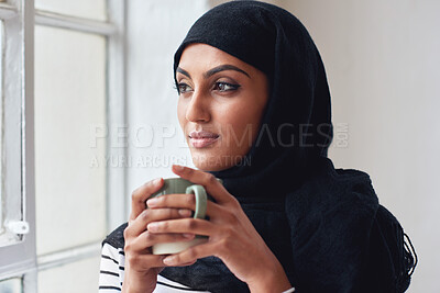 Buy stock photo Window, thinking and Islamic woman with coffee, peace and calm in home, daydreaming and thoughts. Muslim female, hijab and lady with tea, staring outside and ideas for fantasy, future and wondering