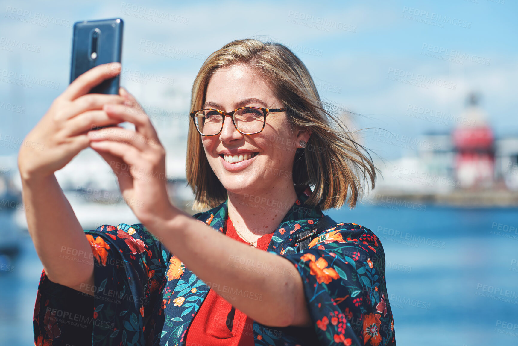 Buy stock photo Selfie, travel and woman with phone by harbor enjoying vacation, holiday and journey in Amsterdam. Freedom, adventure and happy female take picture for social media, post and memory on smartphone