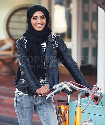 Buy stock photo Muslim, woman and city portrait with bike for eco friendly transport, travel and smile with excited face. Happy islamic girl, gen z student and bicycle transportation with sustainability in metro