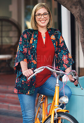 Buy stock photo Portrait, bike and eco friendly with a woman cycling on vintage transport for travel or tourism abroad. Bicycle, riding or tourist with a young female cyclist in an urban town while overseas vacation