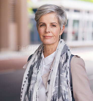 Buy stock photo Portrait, elderly and business woman confident in an urban town or city travel for a startup company. Adventure, mature and senior female traveling international with serious face for tourism