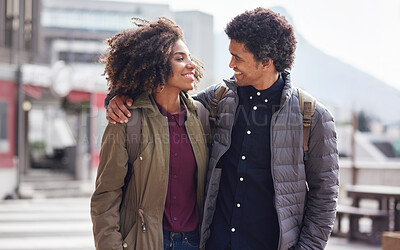 Buy stock photo Love, smile and hug with black couple in city for romance, travel and happy on date. Care, vacation and commitment with man and woman walking in urban town with afro, partner and wellness