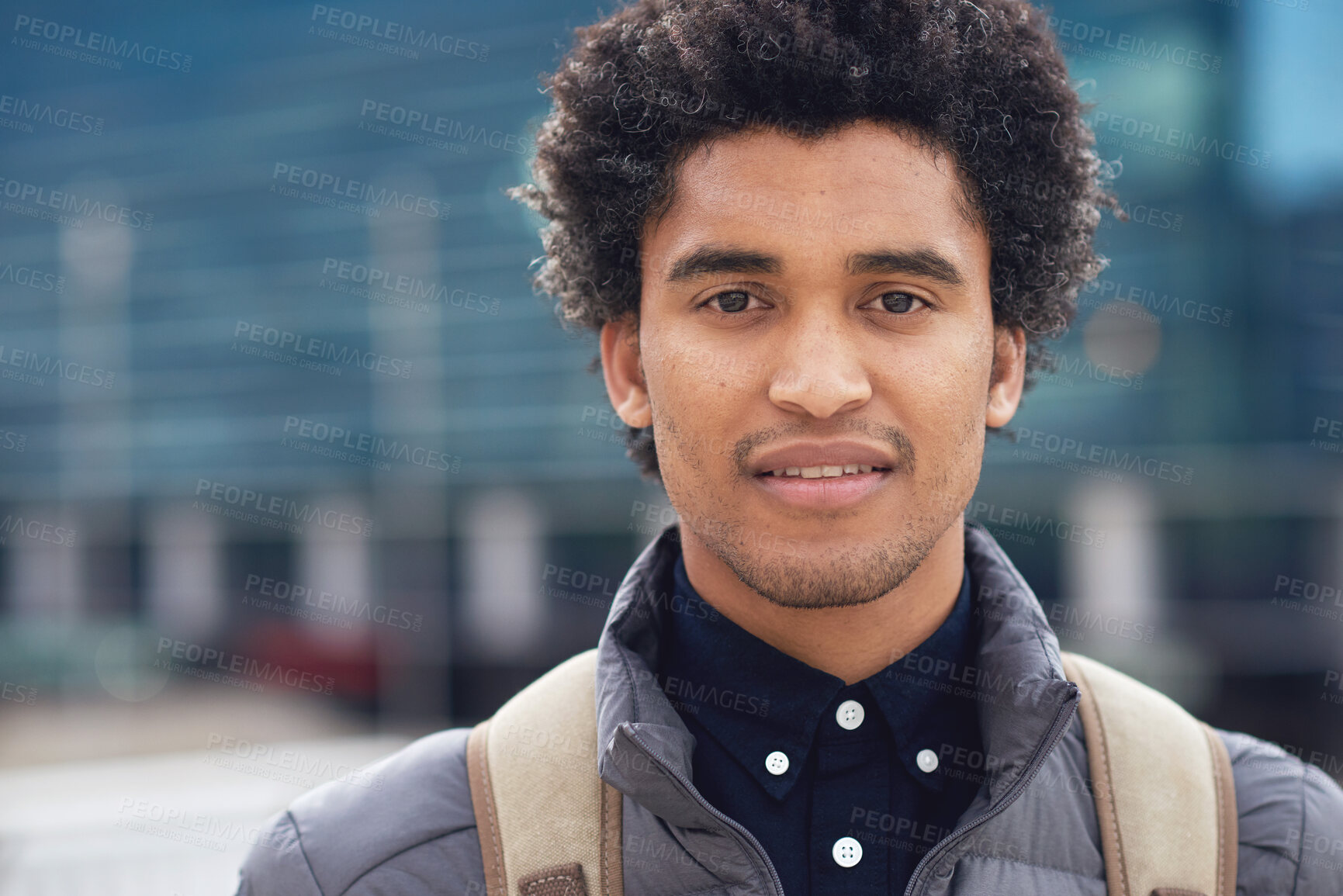 Buy stock photo Black man, city portrait and with backpack for travel, studying and focus by blurred background. Young gen z student, outdoor adventure and happy in metro with goals, vision and dream by buildings