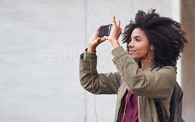 Buy stock photo Black woman, phone photography and travel in the city for tourism or sightseeing in the outdoors. Happy African American female tourist taking picture with mobile smartphone in a urban town on mockup