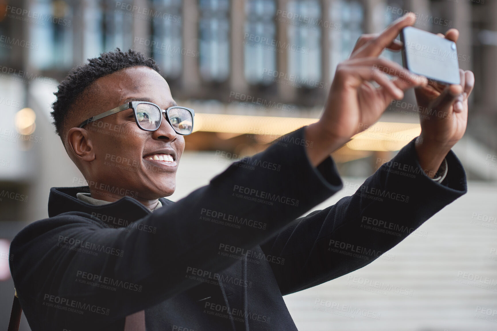 Buy stock photo Business, selfie and smile of black man in city taking pictures for happy memory outdoors. Profile picture, street and male employee taking photo for social media post in urban town for photography.