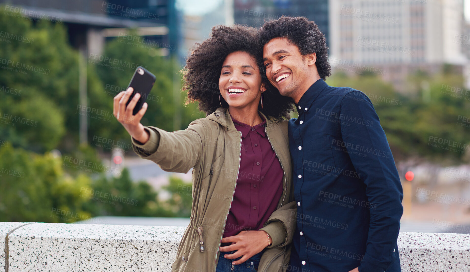 Buy stock photo City, black woman and man with smile for selfie together for social media, technology and happiness in relationship. Friends, love and couple in self portrait, influencer and happy friend on balcony.