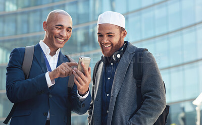 Buy stock photo Business, smartphone and men in city, conversation and online reading to share ideas. Corporate, Islamic male and friends in town, cellphone and discussion for social media, typing and connection