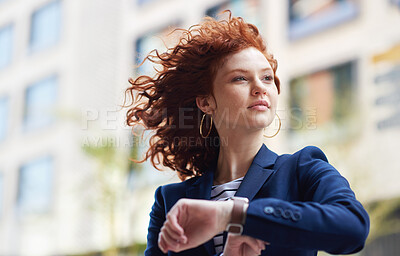 Buy stock photo Woman in city, checking time and watch on wrist on morning commute to work or appointment. Street, schedule and businesswoman looking at smartwatch on urban sidewalk before job interview or meeting.