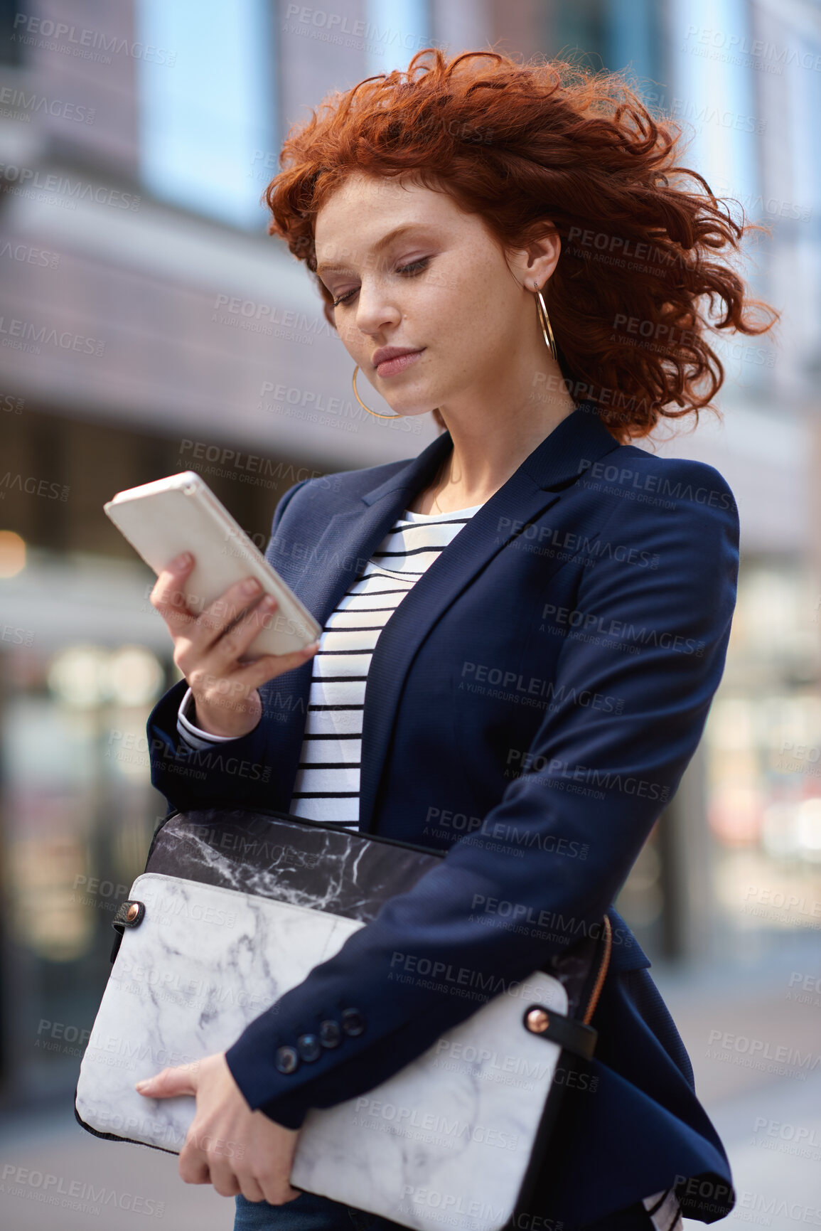 Buy stock photo Business woman, phone and walking in the city for communication, social media or texting and chatting. Female ginger typing on smartphone taking walk with 5G connection, mobile app or travel in town