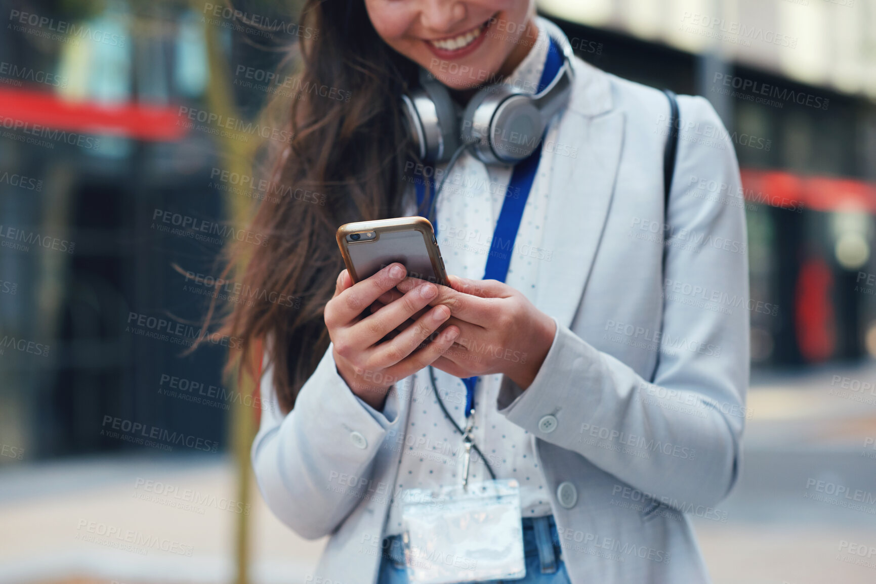 Buy stock photo Business woman, hands and phone with smile in communication, social media or texting in city. Hand of female typing and smiling on smartphone for 5G connection, mobile app or browsing in networking