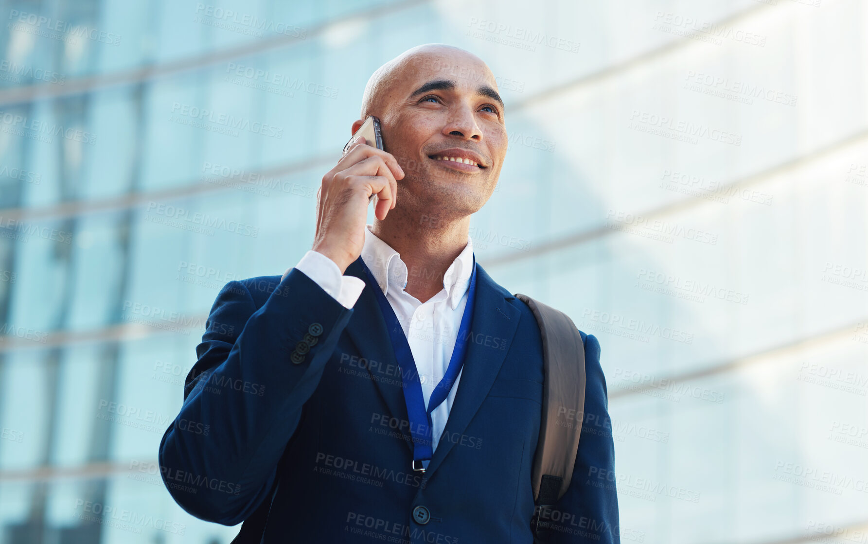 Buy stock photo Office building, phone call and smile, man or lawyer outside city law firm, success and discussion on legal advice. Ceo, boss or happy businessman on sidewalk with smartphone, crm or conversation