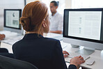 Business woman using computer working in office