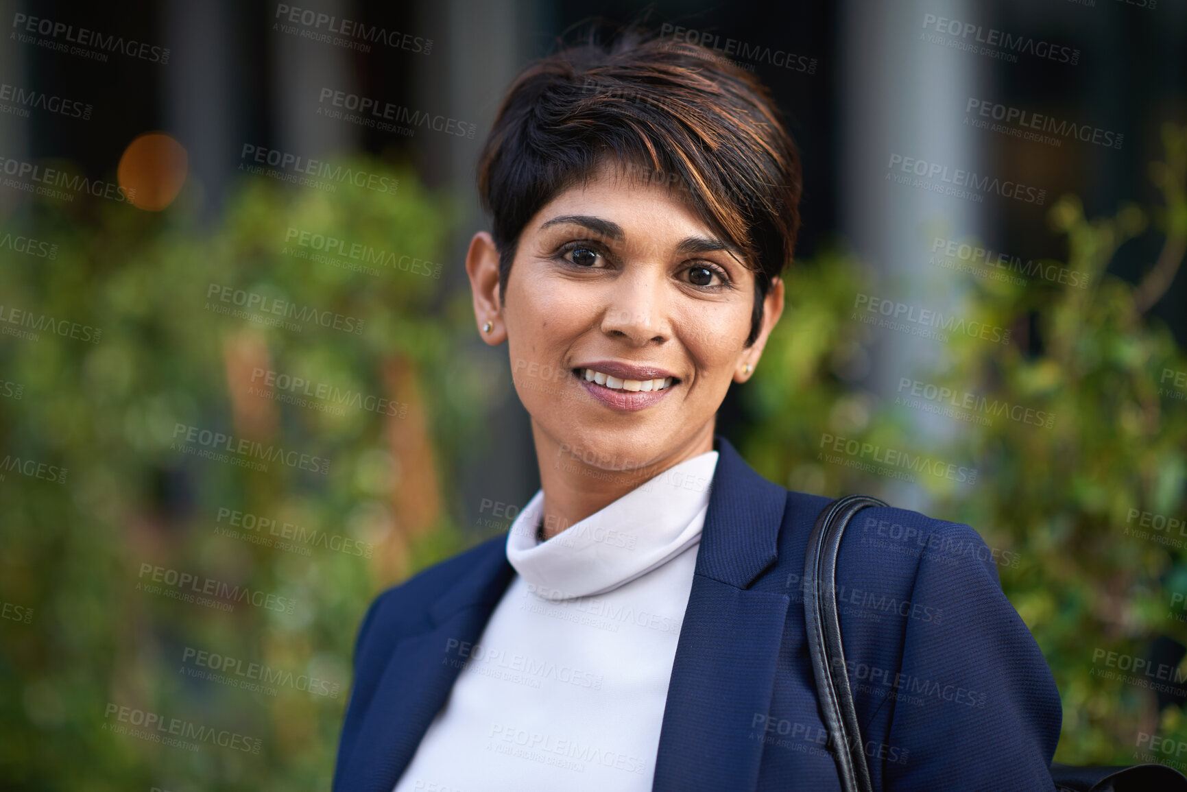 Buy stock photo Portrait, smile and business woman in city with vision, mission and success mindset in urban town outdoors. Ceo, boss face and proud, confident and happy female entrepreneur from India ready for work
