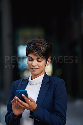 Buy stock photo Business woman, phone and typing in city, texting or internet browsing in street town at night. Technology, cellphone and female entrepreneur with 5g mobile smartphone for networking or social media.