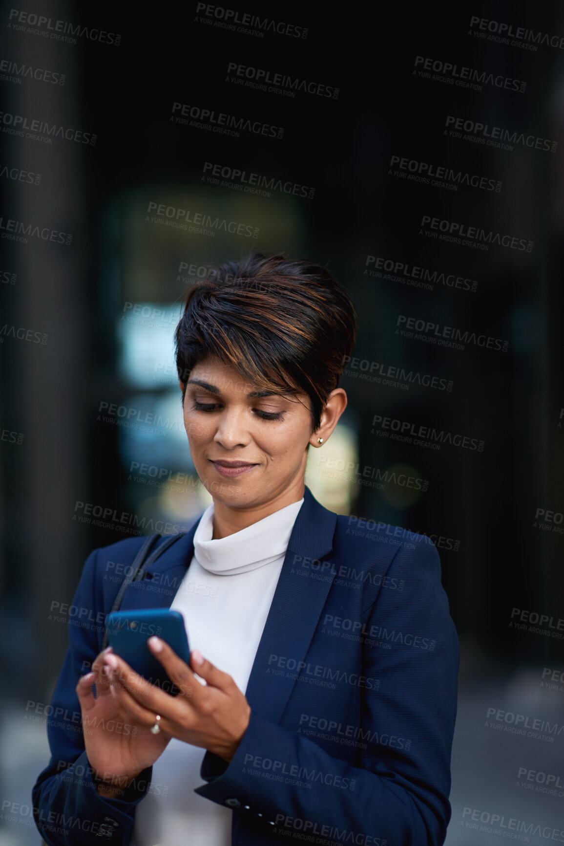 Buy stock photo Business woman, phone and typing in city, texting or internet browsing in street town at night. Technology, cellphone and female entrepreneur with 5g mobile smartphone for networking or social media.