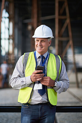 Buy stock photo Construction, engineer and man with phone thinking outdoor about building project management. Contractor person and smartphone for civil engineering, safety and development at site for vision or idea