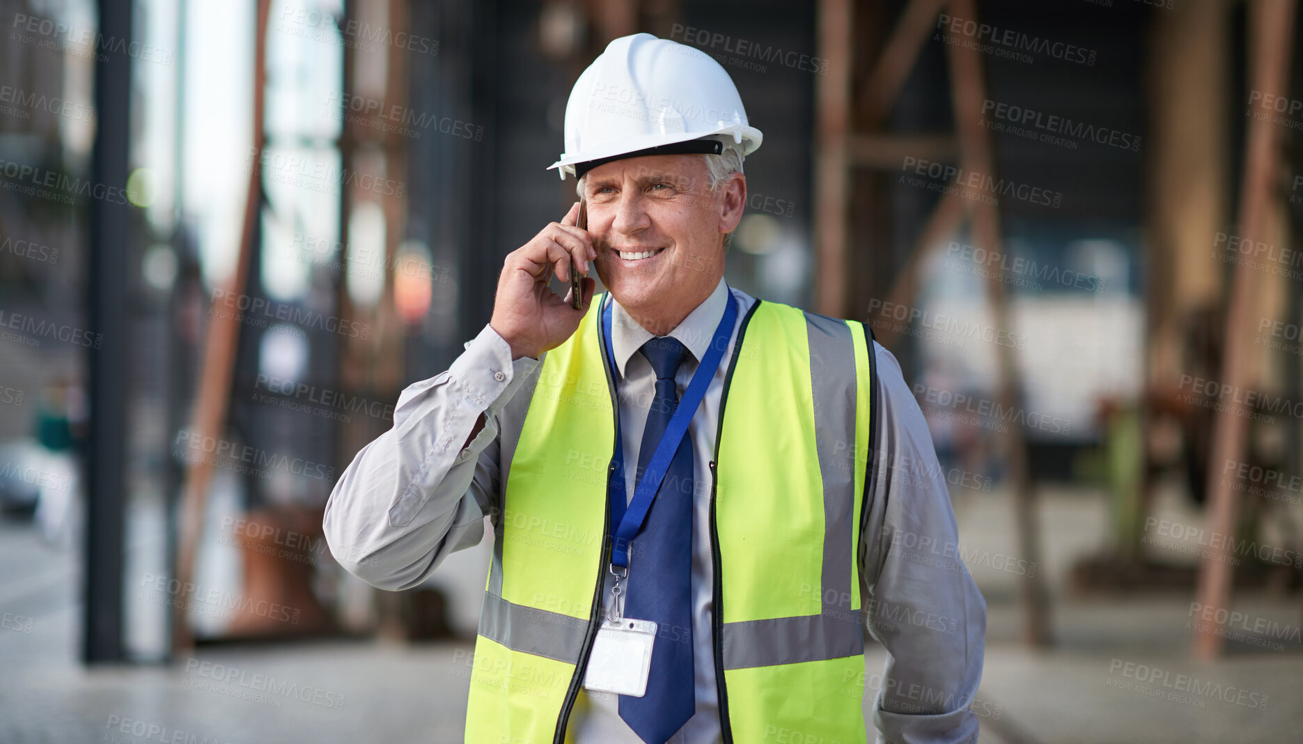 Buy stock photo Construction, engineer and phone call of a man outdoor for building project management. Senior contractor person talking to industry contact about civil engineering, safety and development at a site