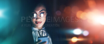 Buy stock photo Businesswoman, phone and communication at night for texting, chatting or networking on dark background. Female employee smile holding smartphone working late for online planning strategy on mockup