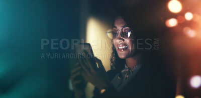 Buy stock photo Businesswoman, phone and communication at night for social media, chat or networking on dark background. Female employee smile holding smartphone working late for online planning strategy on mockup