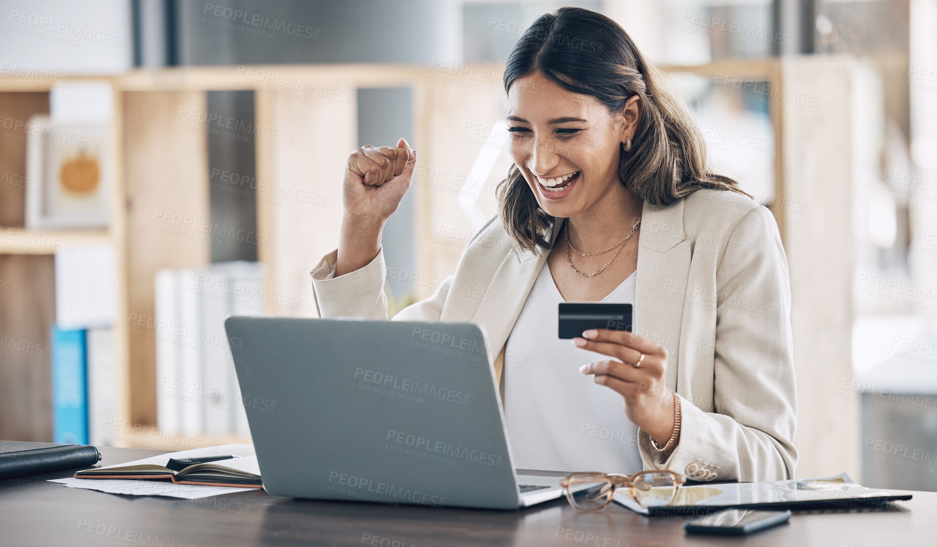 Buy stock photo Finance, credit card and success with woman and laptop in office for savings, investment or online shopping sale. Winner, fintech and ecommerce with customer and website for deal, payment or offer