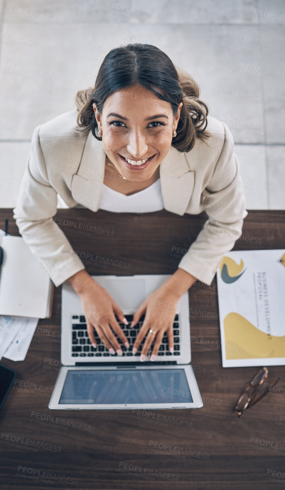 Buy stock photo Top view, portrait or business worker on laptop in company finance management, investment strategy or global financial growth. Smile, happy or woman typing on technology for budget planning or ideas