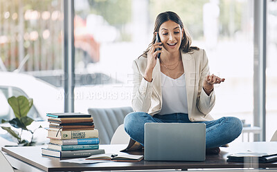Buy stock photo Worker, laptop and phone call and sitting on desk in relax startup, marketing company or advertising business. Smile, happy and talking woman on mobile communication technology, laptop or books study