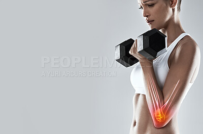 Buy stock photo Fitness, weightlifting and dumbbell, arm injury and woman in pain, red overlay and x ray with skeleton on studio background. Mockup, bodybuilder and inflammation, medical emergency and muscle tension