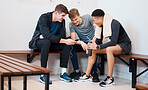 Fitness, phone and friends in gym locker room after practice, exercise and training together. Wellness, sports club and men on smartphone for social media, listening to music and relax from workout