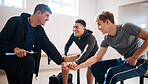 Sports, teamwork and men in gym locker room ready for game practice, exercise and training. Fitness, motivation and athletes with hands stack together for match, workout and sport success with coach