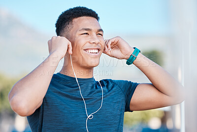 Buy stock photo Music, fitness and man thinking of running, exercise, and workout in the city of Brazil. Motivation, ready and young runner listening to a podcast, audio or radio to start training in the morning